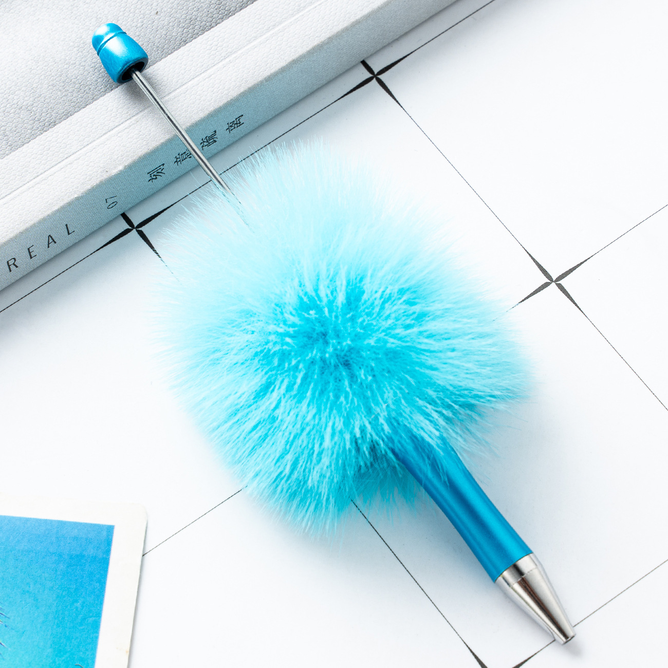 Bleu ciel (boule de poils)