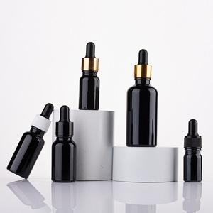 Venta al por mayor vacío 5ml 10ml 15ml 20ml 30ml 50ml 100ml Cuidado de la piel esencia botella de aceite esencial de vidrio negro con cuentagotas - Product Image 3