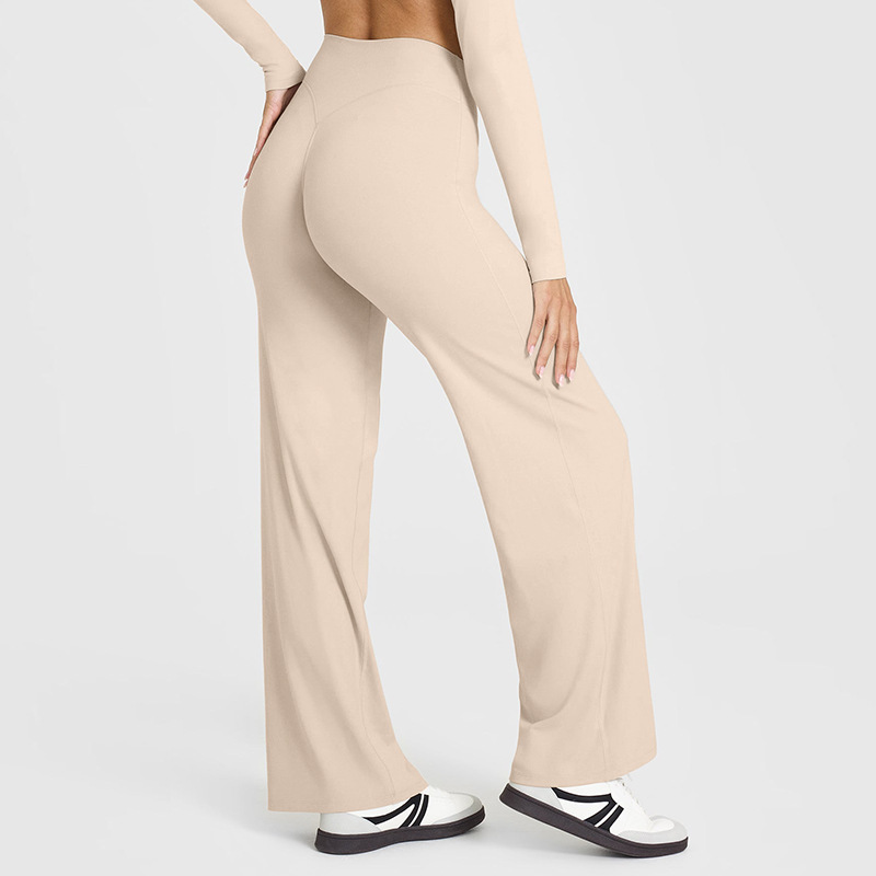 Pantalon évasé coupe classique, couleur abricot laiteux