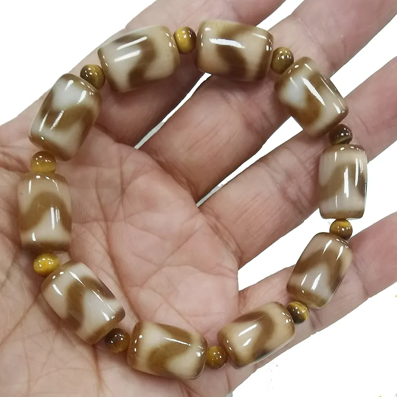 Tiger Teeth Dzi Beads Pulseras con cuentas