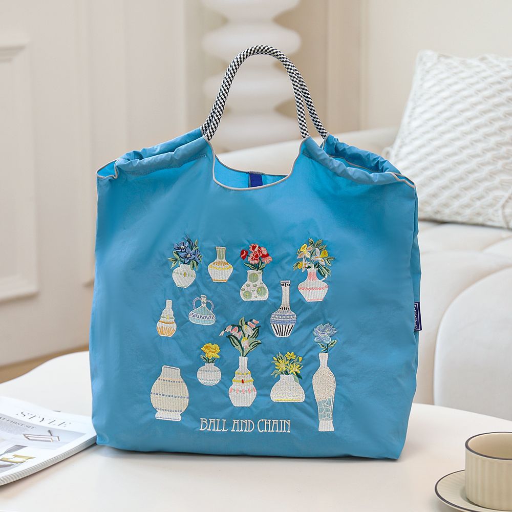 Arrangement de fleurs bleu lac vase-grande taille