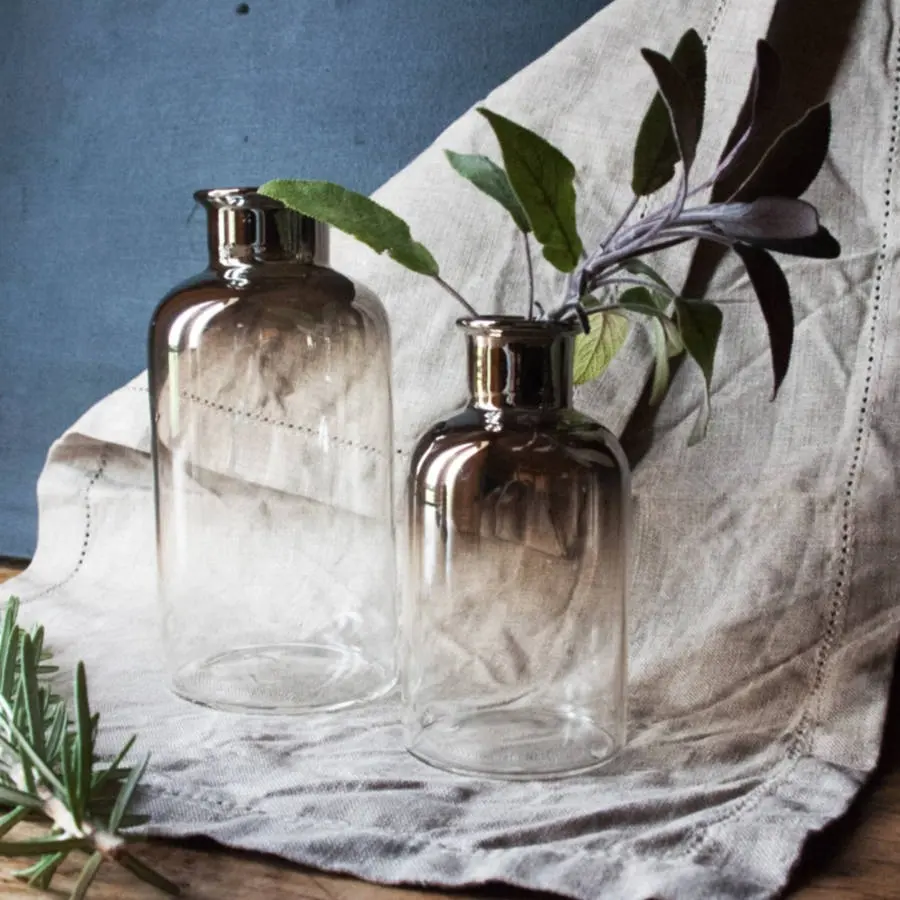 Beautiful smoky grey glass bottles or Glass Vase that have a mercury, dipped ombre finish
