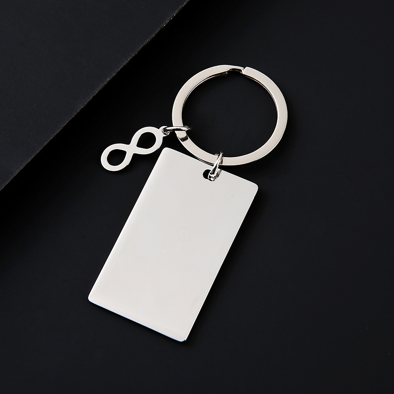 Porte-clés rectangulaire argenté avec logo infini, 45x27mm