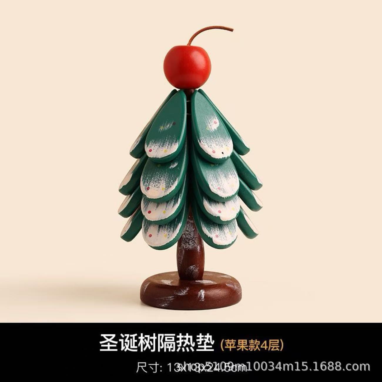 Four-tiered Christmas tree with apples