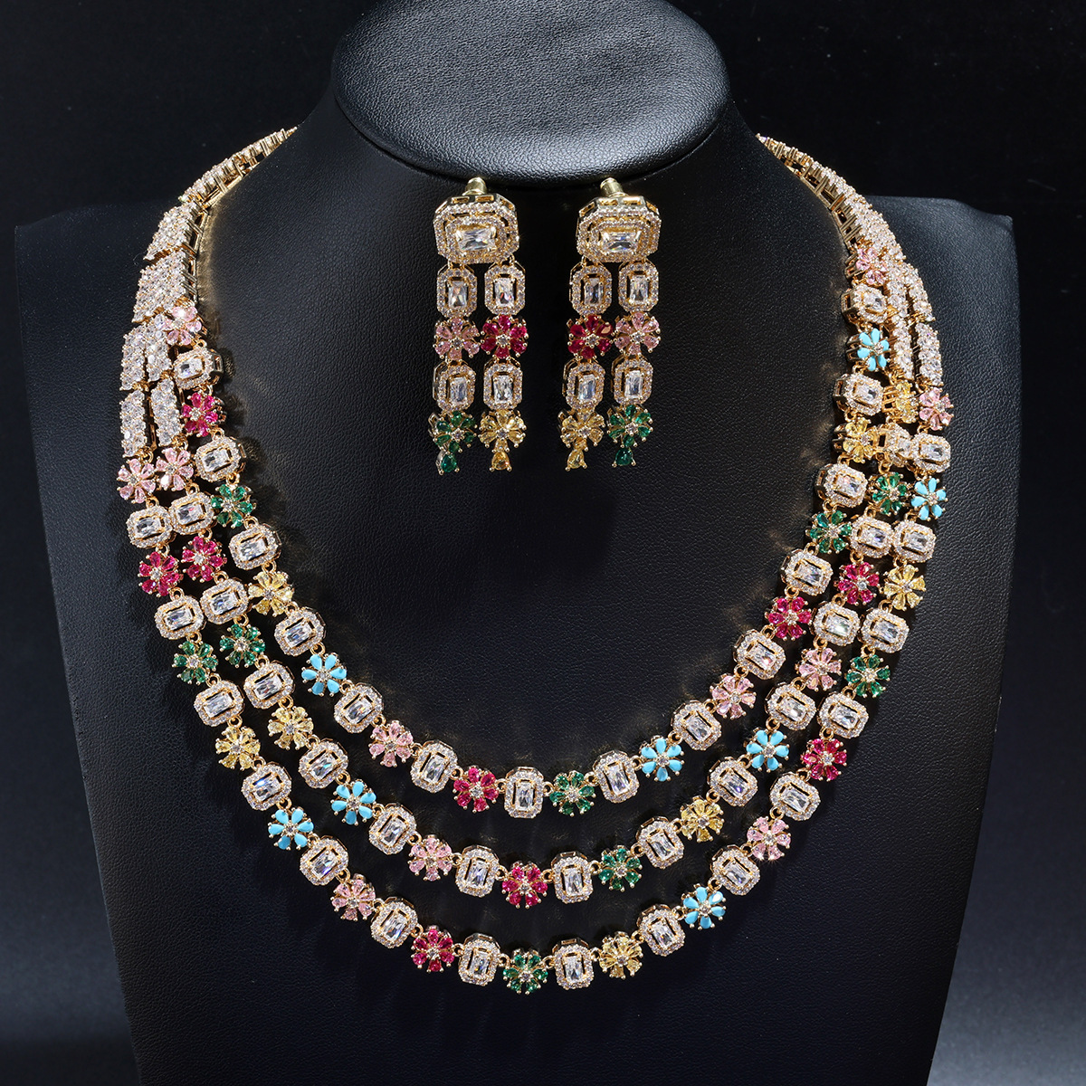 Collier et boucles d'oreilles en zircon couleur or