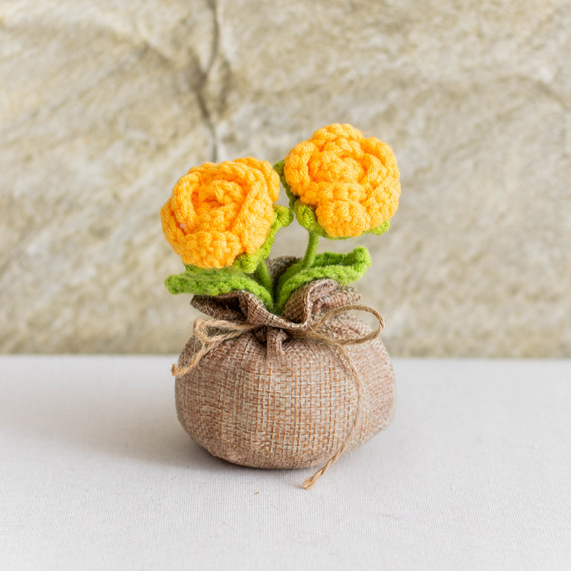 Bolsa de la suerte con rosa naranja de doble cabeza.