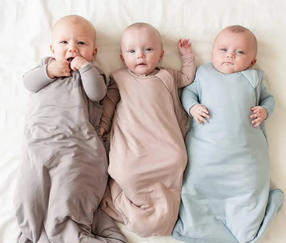 Ropa de bebé recién nacido niños saco de dormir tela lisa sólida 0,5 Tog 1,0 Tog 100% bambú Spandex tejido saco de dormir