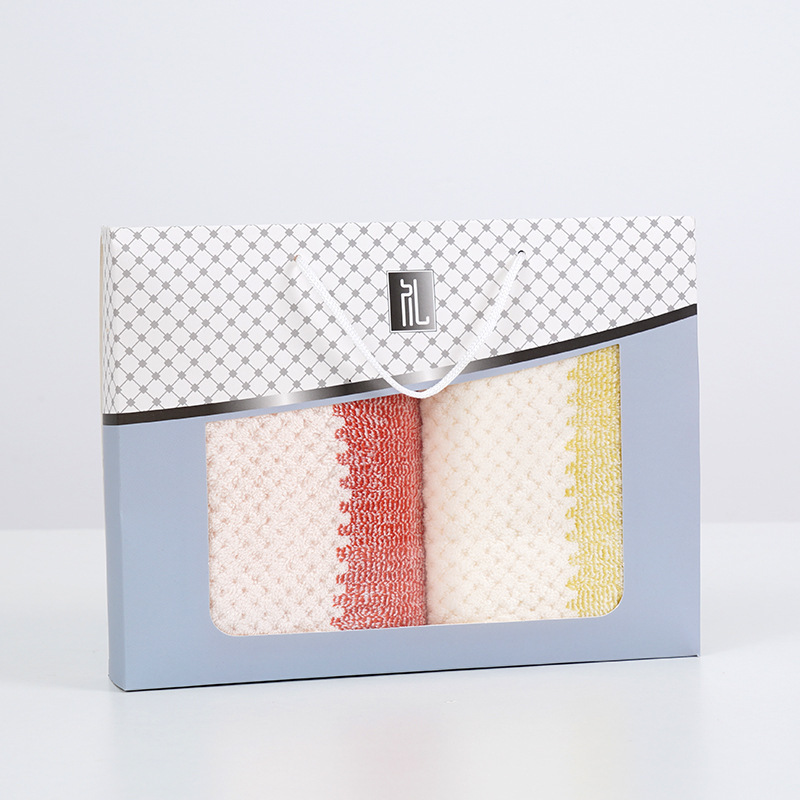 Towel gift box containing two towels (red and yellow)