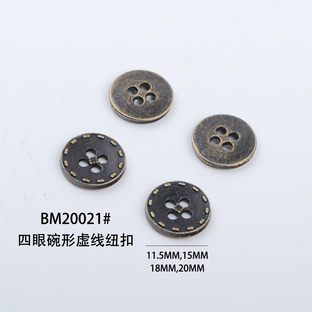 Bouton doré 20 mm en forme de bol à quatre trous avec ligne pointillée.