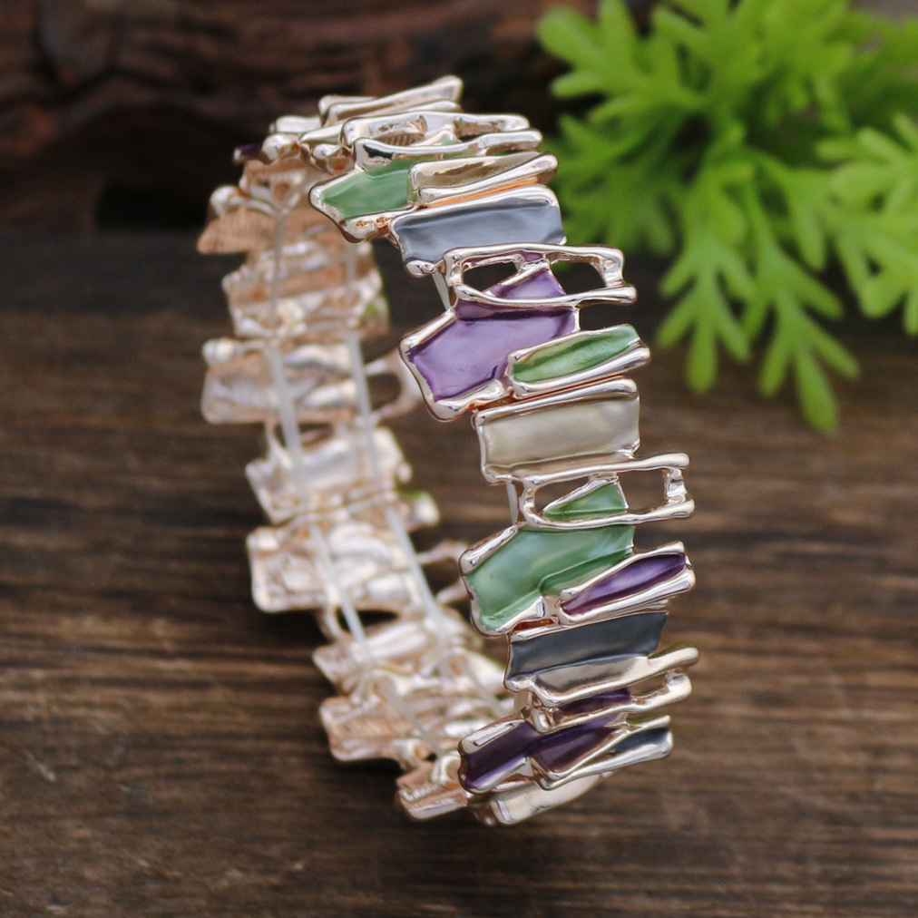 Bracelet irrégulier violet-vert-or rose