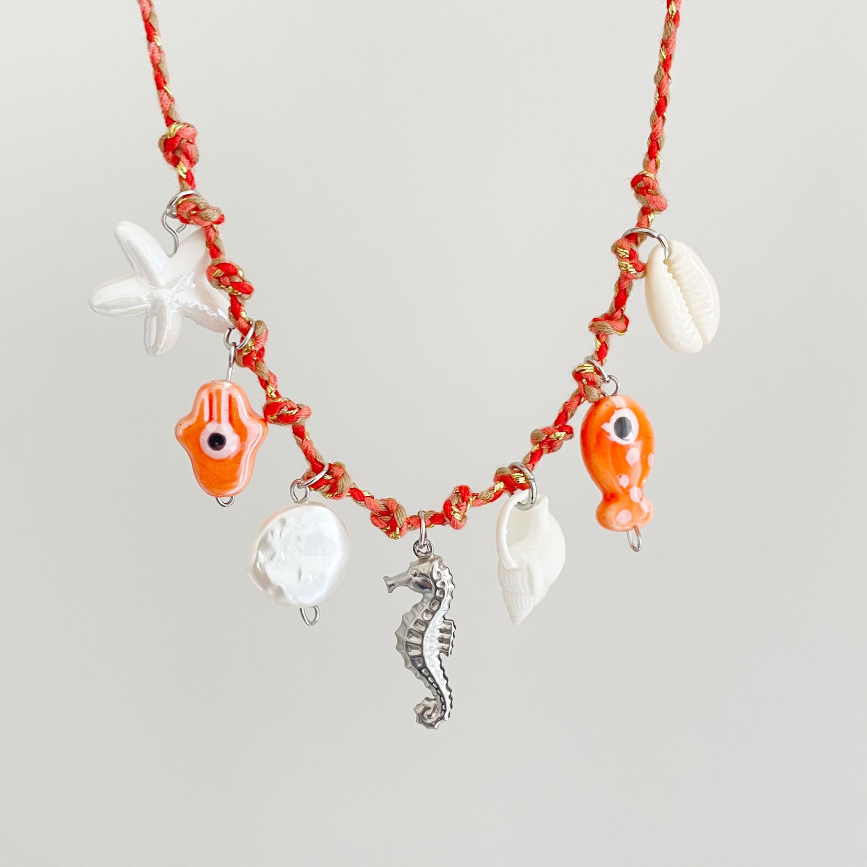 Collana con ciondolo a forma di cavalluccio marino (rosso)