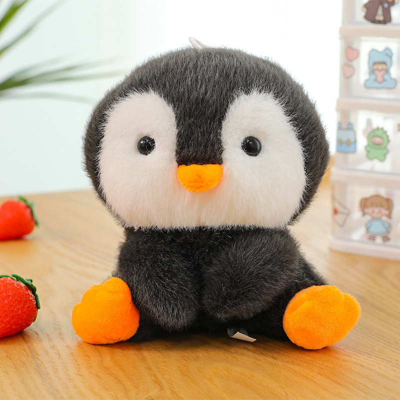 Compagno da tavolo bambola-pinguino