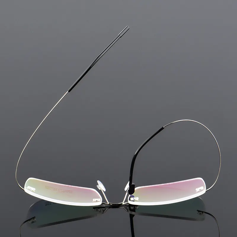 Heißer Verkauf Günstiger Preis leichte Legierung Tempel Männer randlose optische Rahmen Brille