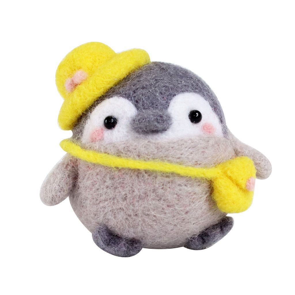 Un petit pingouin en sortie avec porte-clés