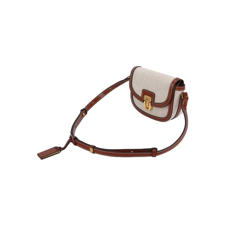 Koreanische Version Wasserdichtes echtes Leder Modische Damen Umhängetasche Leder Leinwand Retro abschließbare Tasche und Tasche