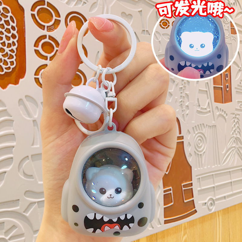 Gray glowing backpack with bell