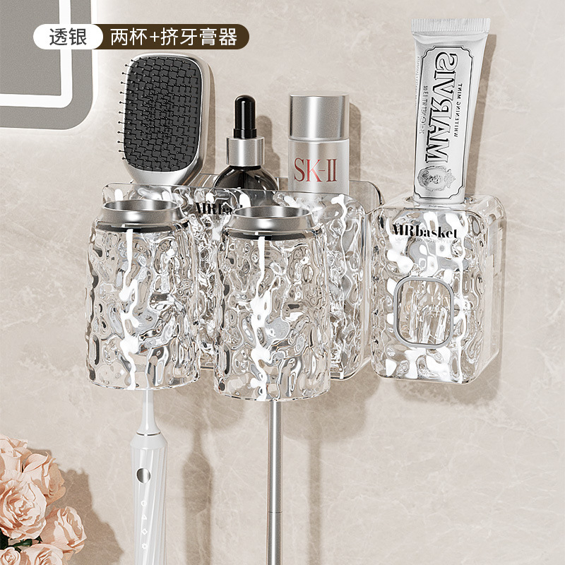 Distributeur de dentifrice double, argent translucide.