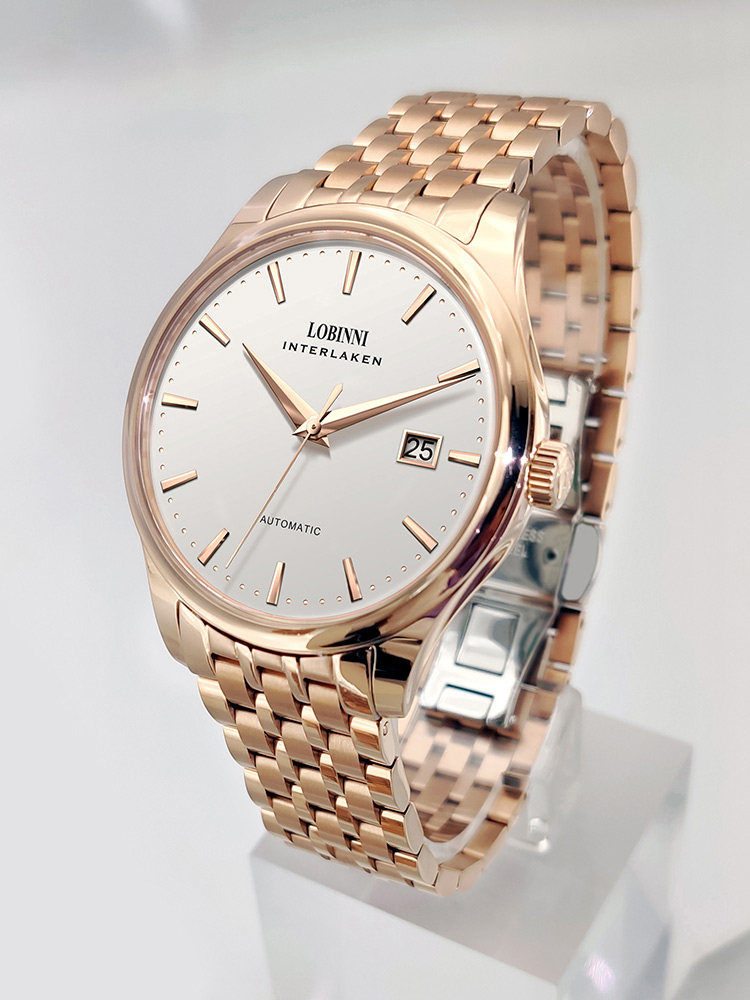 Boîtier rose - cadran blanc - bracelet en acier