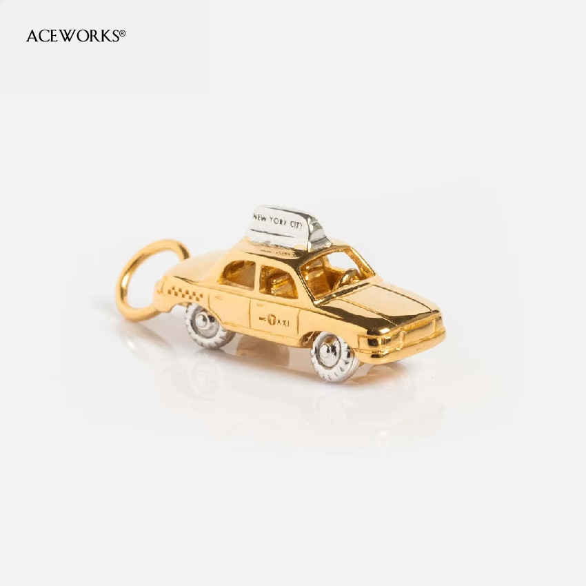 Taxi Charm Gold
