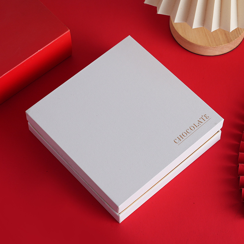 Caja de regalo blanca con 16 rejillas para tonos de piel.