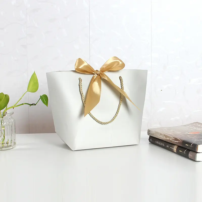 Wholesale Paper Bag Luxury Custom Brand Logo Gift Clothes Shopping Paper Bag With Bowknot