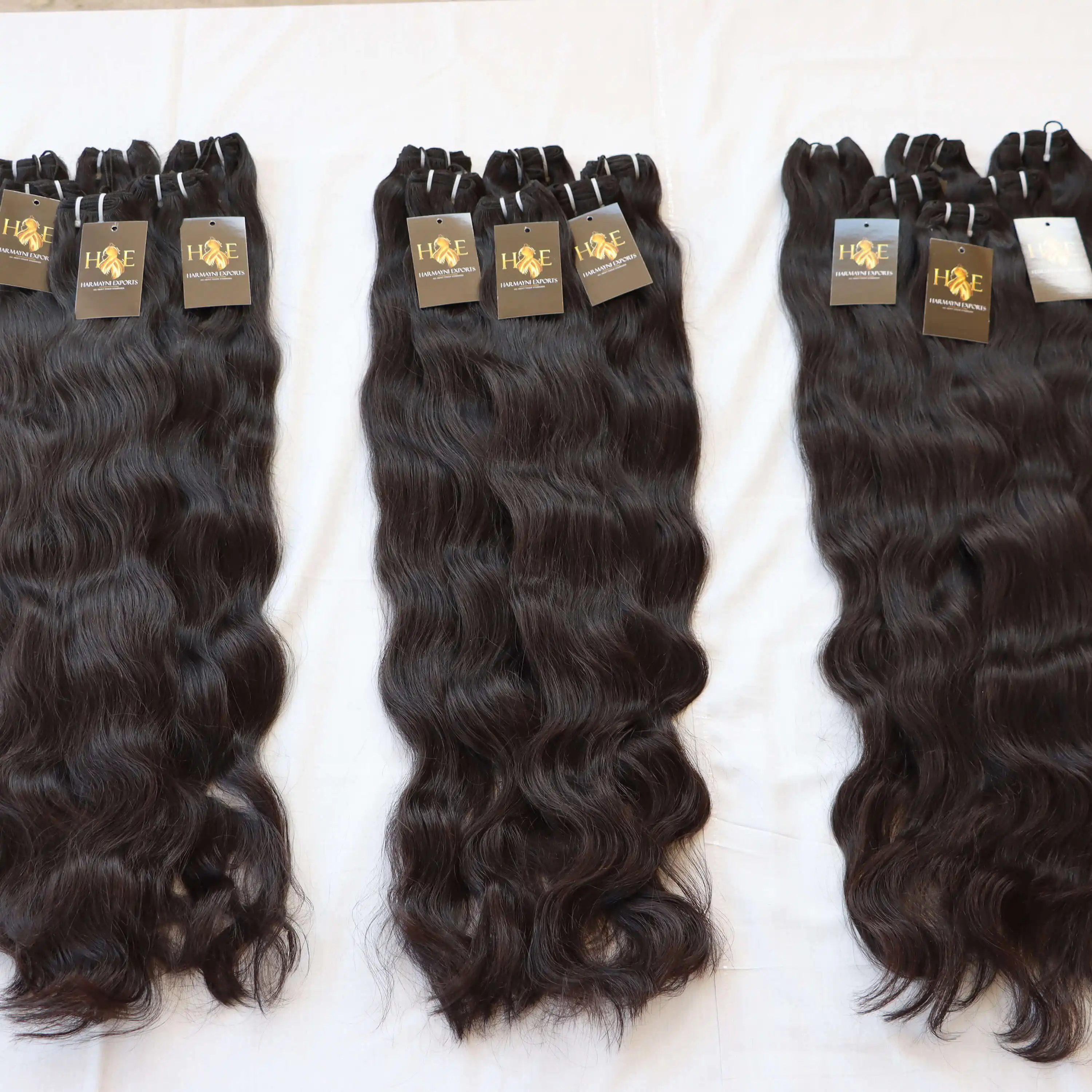 Temple Indian Virgin Raw Straight Hair Brasileño Raw Mink Proveedor de cabello humano Ondulado Deepwave Natural Black Hair Bundles
