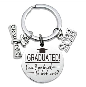 Moda novo <span class=keywords><strong>design</strong></span> metal ano encantos presente borla <span class=keywords><strong>2025</strong></span> graduação sublimação chaveiro