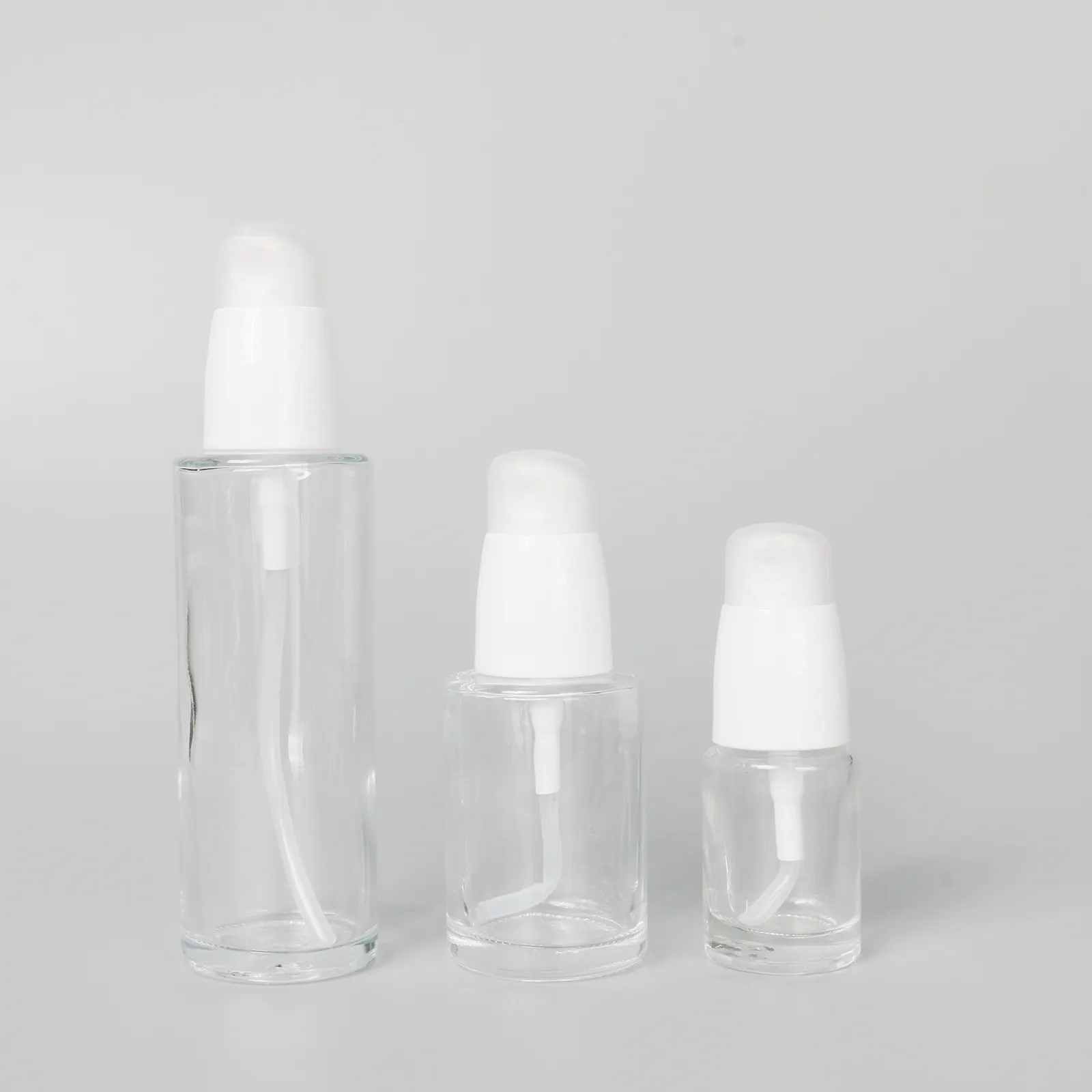Botella de suero facial transparente, envase redondo de 30ml, ecológico, con bomba
