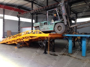 Plataforma de carga móvil industrial con alta capacidad de carga y construcción duradera para un manejo eficiente de la carga - Product Image 5