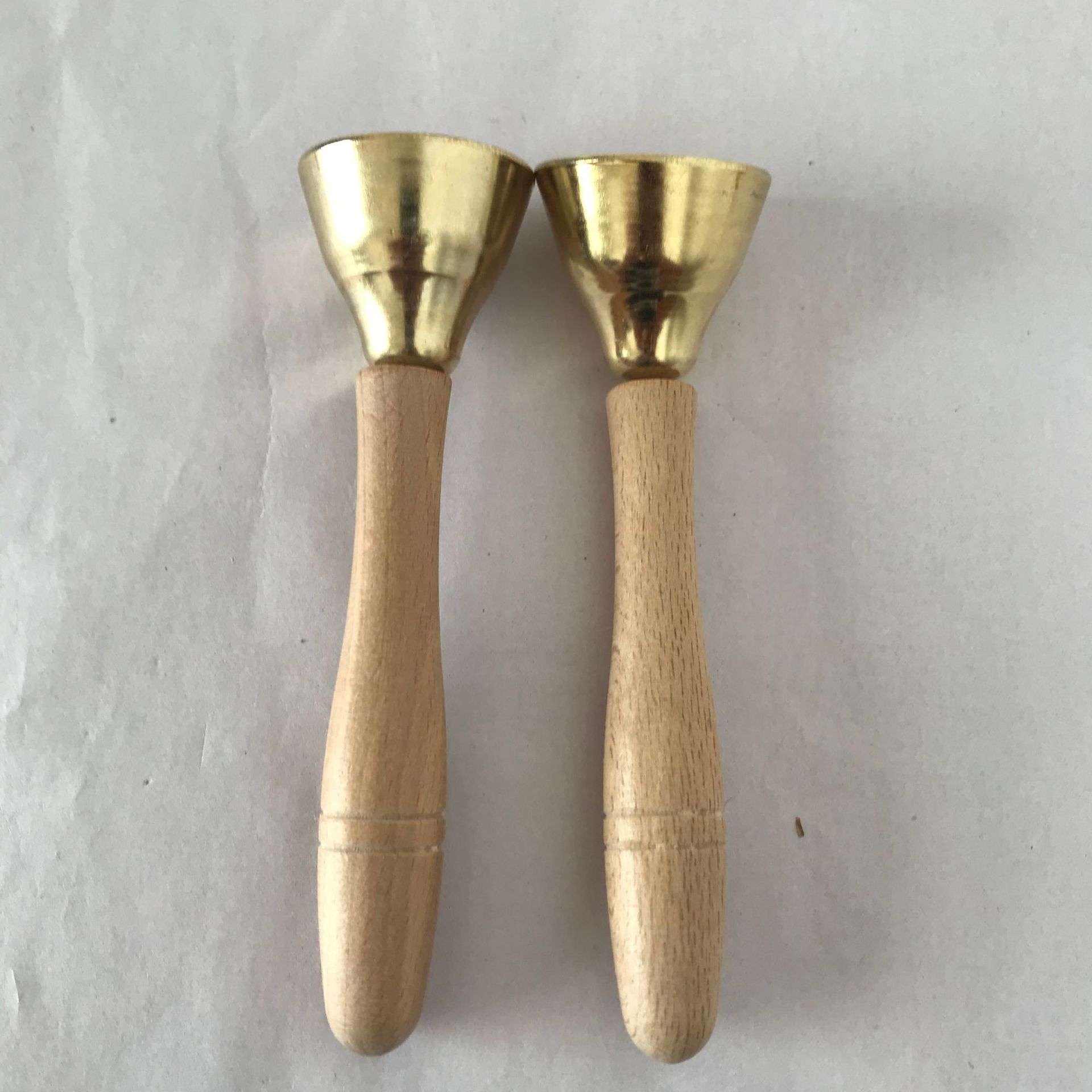 Small iron bell with wooden handle