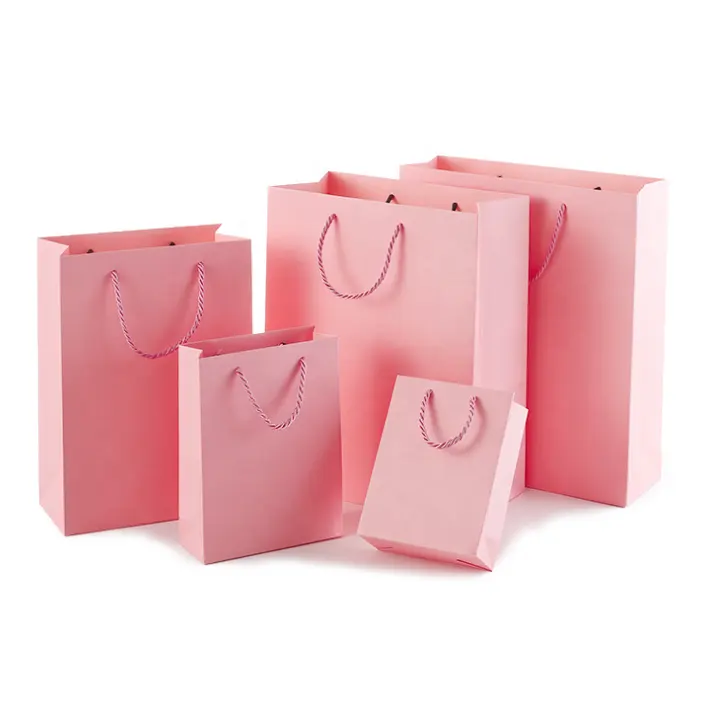 Xiaoyin-bolsas de embalaje de color rosa con tu logotipo, bolsas de papel de alta calidad personalizadas, de lujo, para compras, con asas, venta al por mayor