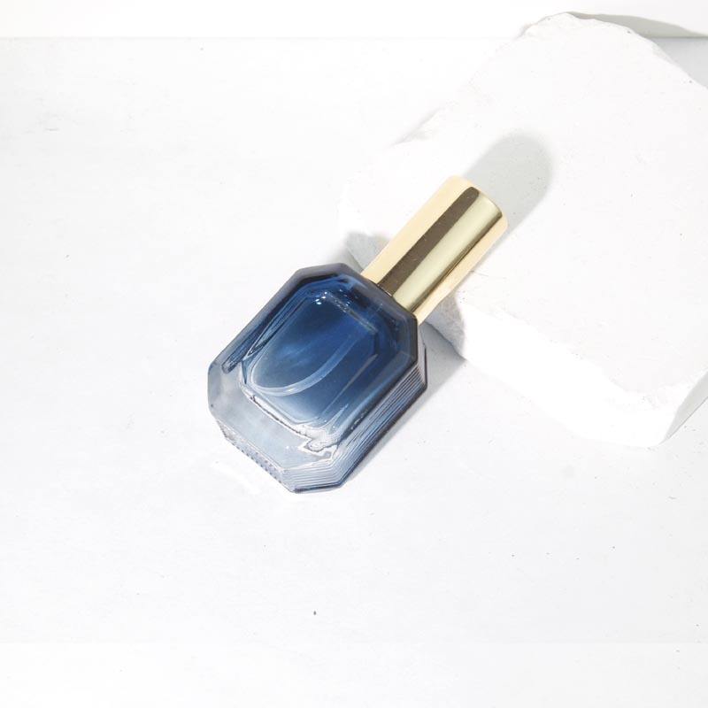 Blue gradient bottle + gold nozzle cap