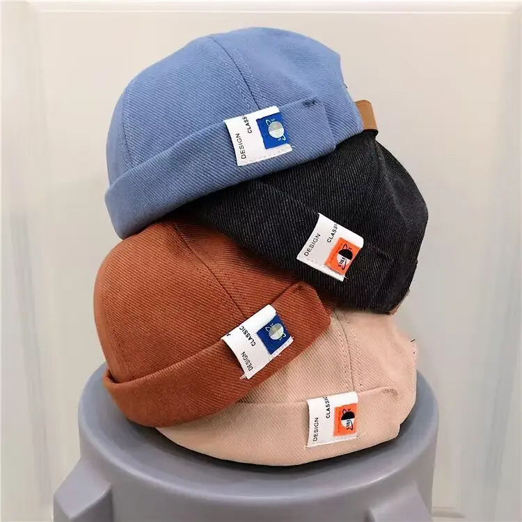 Venta caliente Retro algodón Sin borde ajustable sólido Docker sombrero gorros sin visera marinero propietario gorra