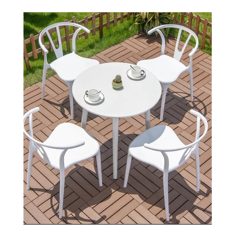 Ensemble de meubles élégants de café en plein air de style français blanc table ronde en métal avec 4 chaises ensemble de salle à manger en plein air pour café