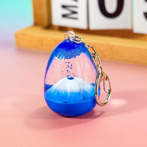 Areias Flutuantes Erupting Volcanic Bubble Sandglass Liquid Motion Bubbler Snowball Water Globe Keyring em Egg <span class=keywords><strong>Shape</strong></span>