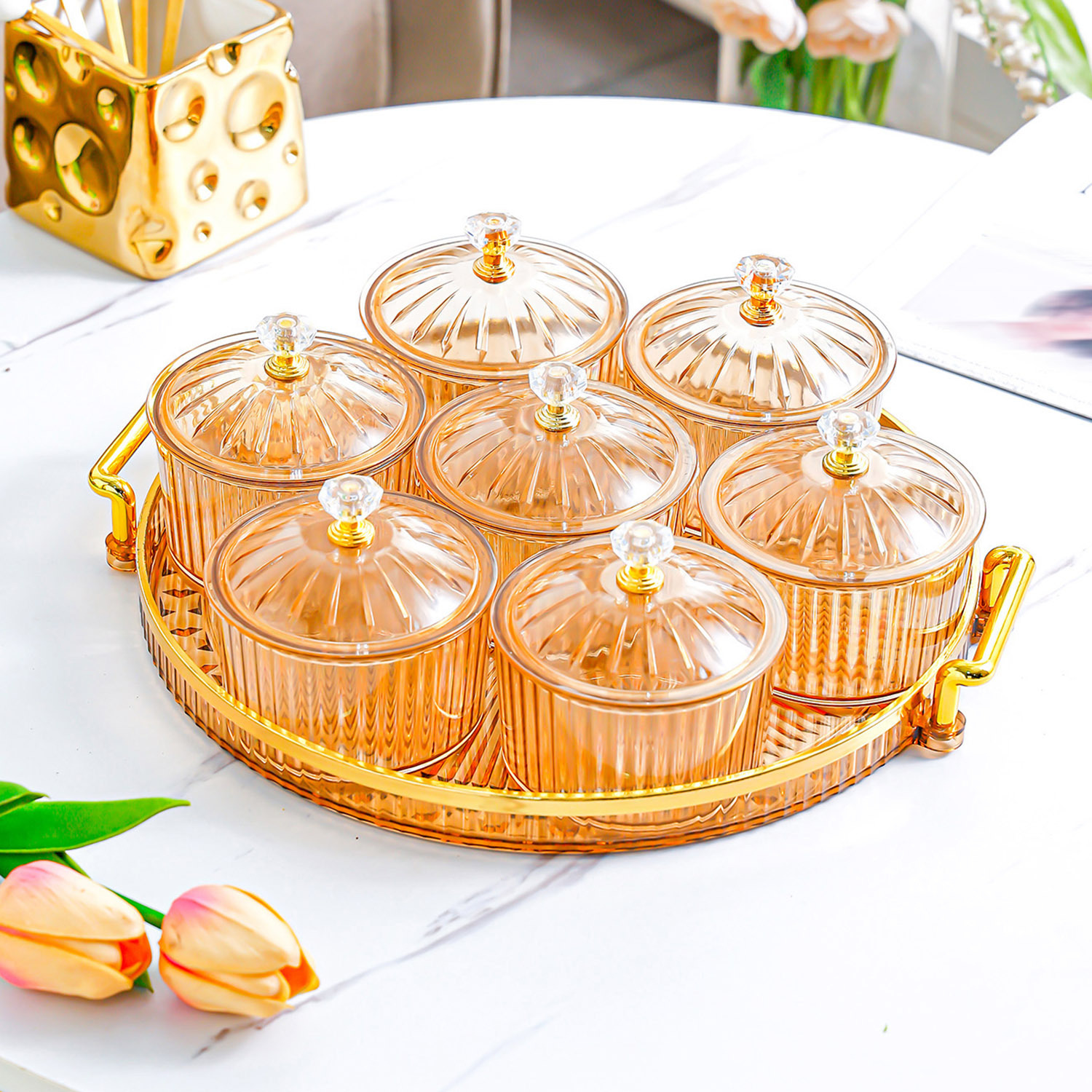 Amber-colored gold-rimmed round plate with 7 serving dishes