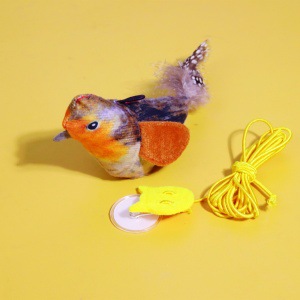 Pájaro naranja para colgar en la puerta.