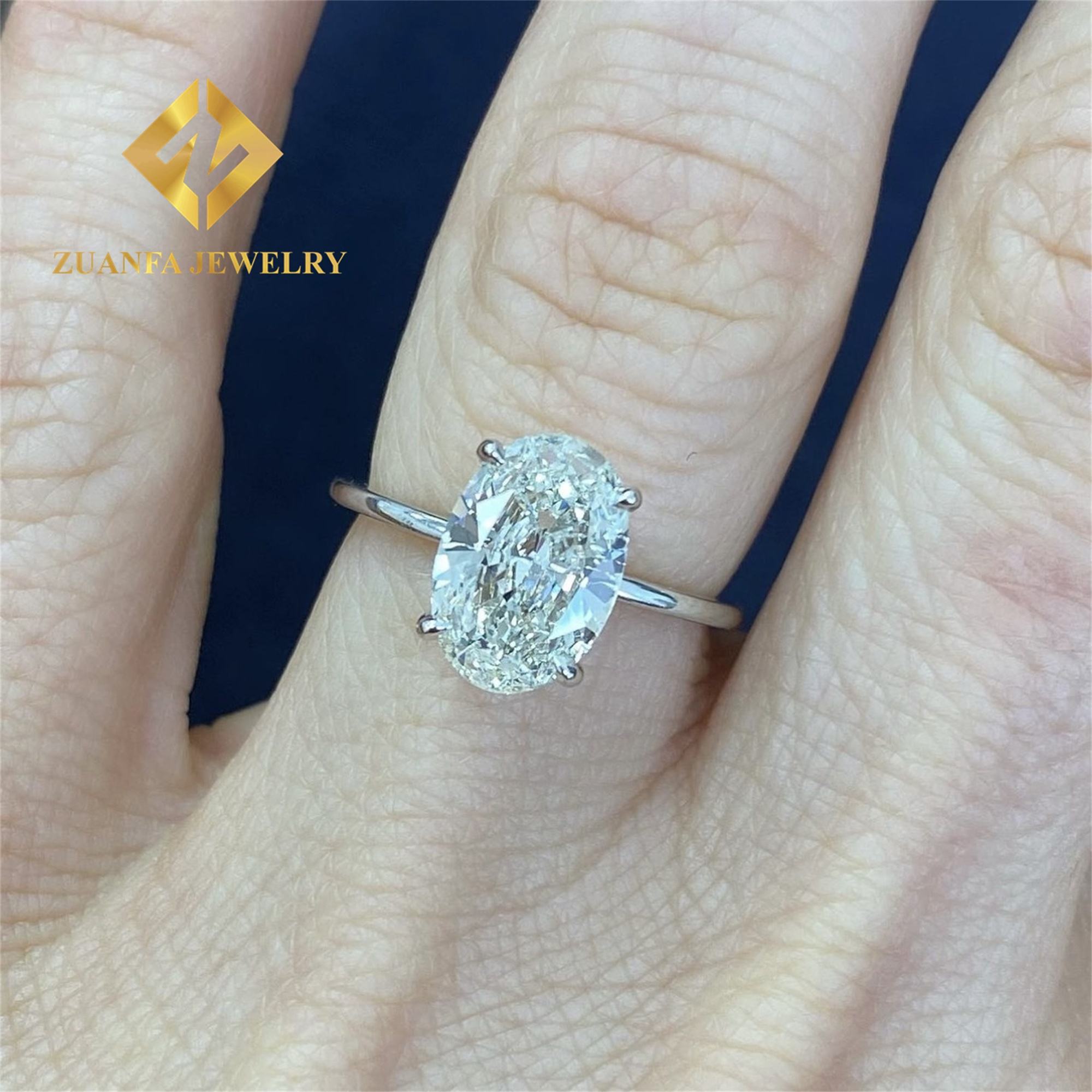 10k white gold with 3ct Oval moissanite