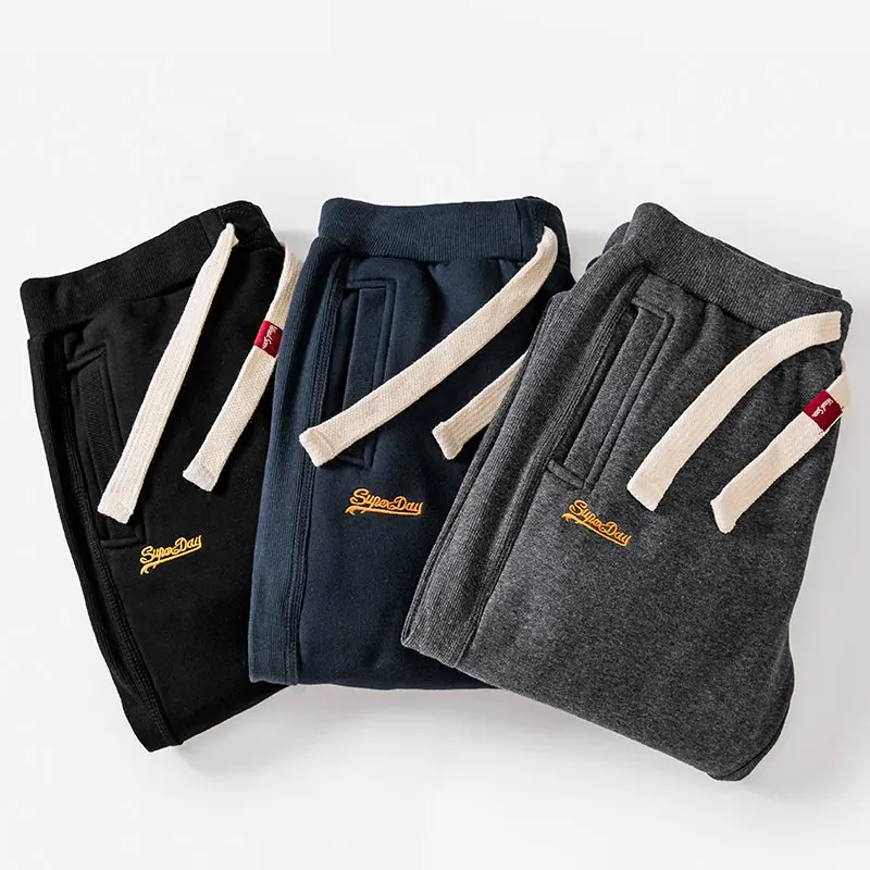 Pantalon de survêtement éponge français hommes lâche OEM hommes Sport coton pantalon décontracté personnalisé velours joggers imprimé logo empilé pantalons de survêtement