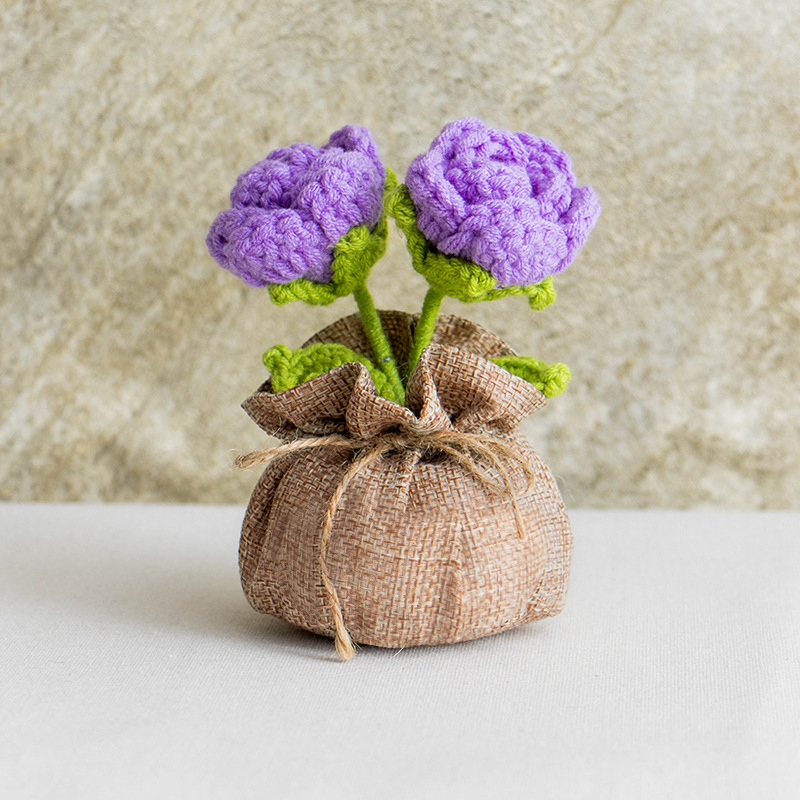 Bolsa de la suerte con rosa púrpura de doble cabeza.
