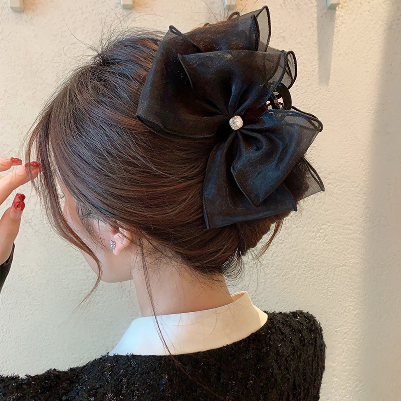 9 black rhinestone bows
