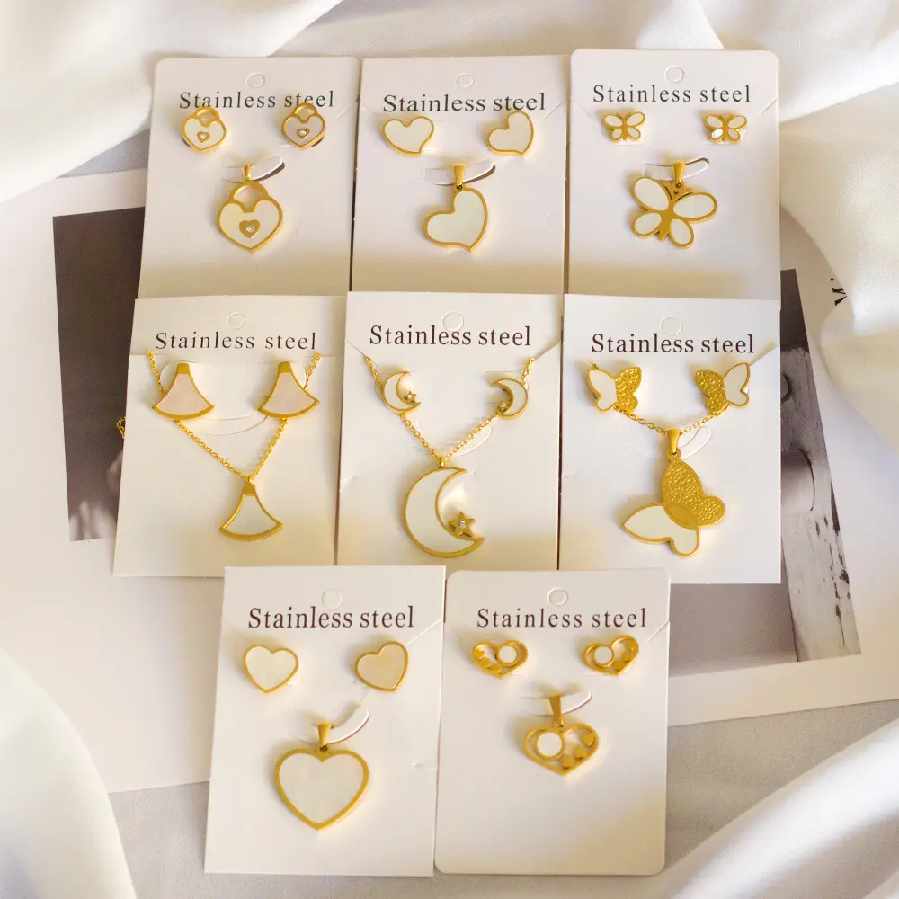 Joyería de acero inoxidable de alta calidad para mujer, pendientes de tuerca chapados en oro de 18K, colgante de circonita con letras famosas, conjunto de joyería