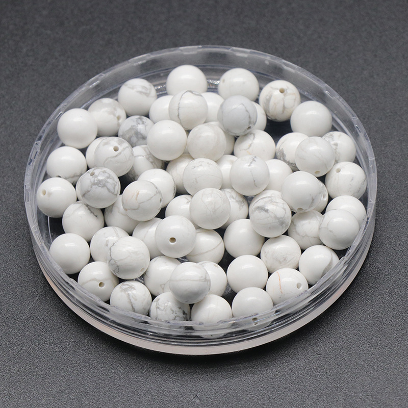 Howlite da 8 mm con mezzo foro - pezzo singolo