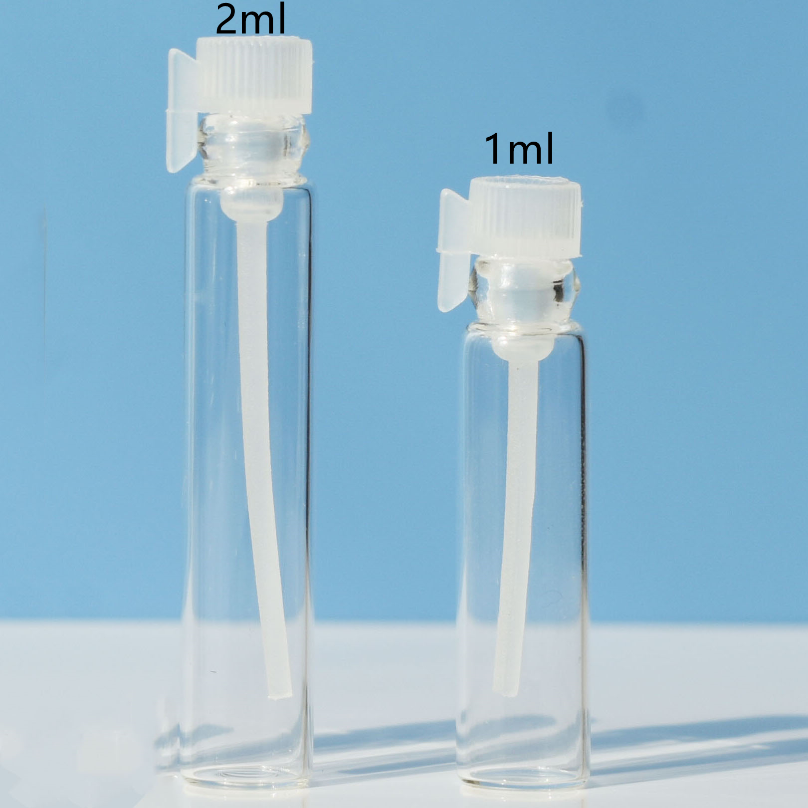 clear vial + white lid