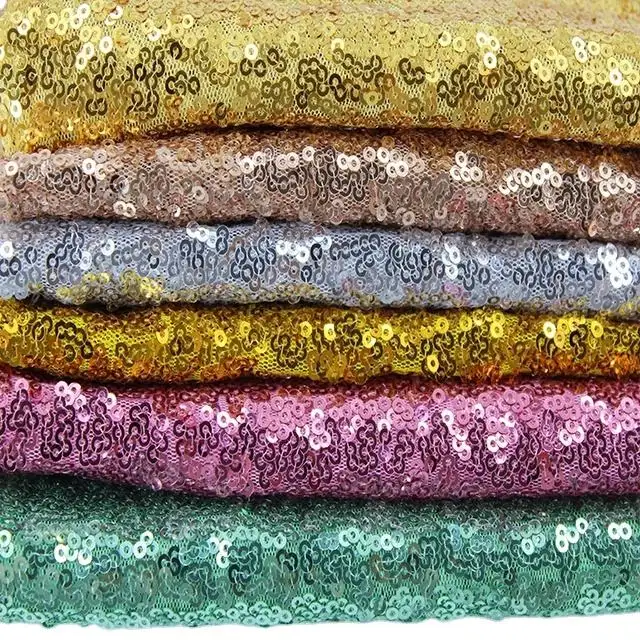 Tessuto multicolore con paillettes in poliestere tessuto satinato lucido