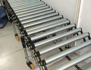 Rodillo transportador de carga extensible de altura ajustable, con motores para contenedor de camión - Product Image 2