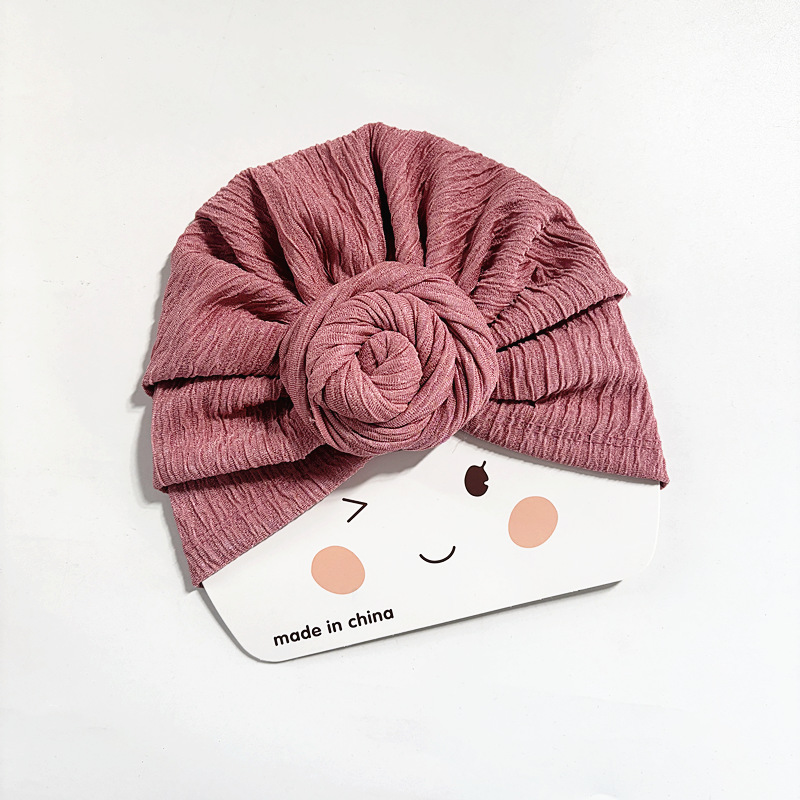 Pink-wavy snail hat