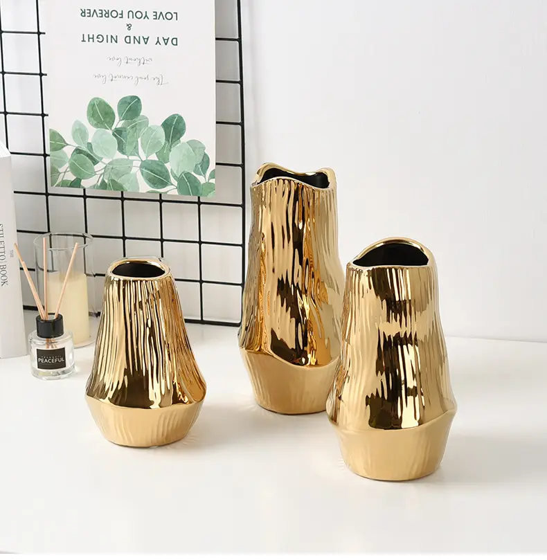 新製品のアイデア2023モダンな不規則なゴールドの花瓶の装飾リビングルームデスクの装飾花瓶とゴールドセラミックフラワー花瓶