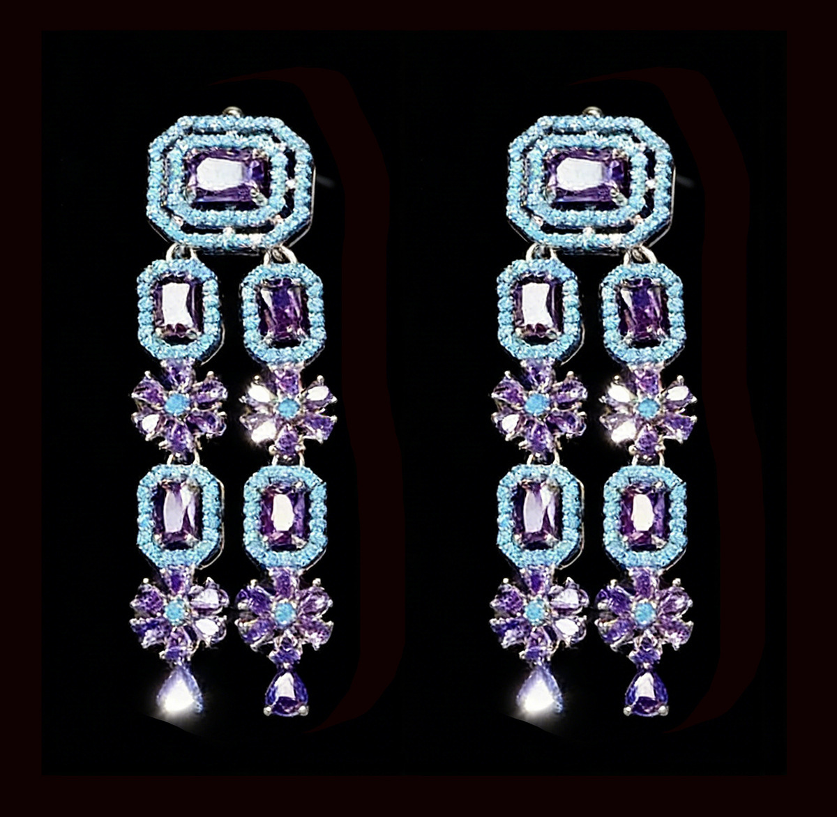 Boucles d'oreilles zircon bleu sur fond argenté