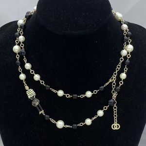 ファッショナブルなセーターチェーンヨーロッパとアメリカのレトロな気質CCレター